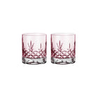 To rosa fasettslipte krystallglass i skandinavisk design med diamantmønster fra Frederik Bagger.