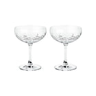 To klare champagneskåler i krystallglass med diamantmønster fra Frederik Bagger.