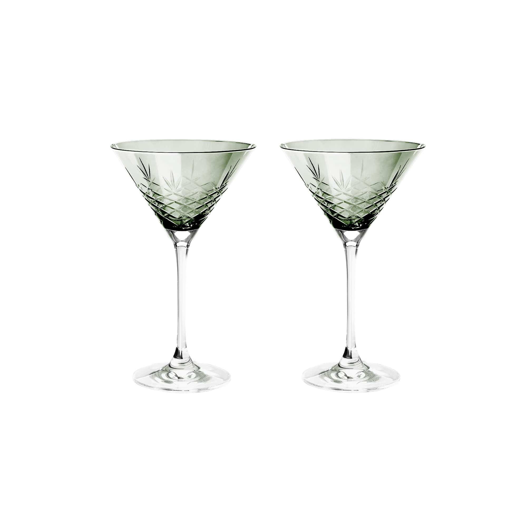 To grønne fasettslipte krystallcocktailglass i skandinavisk design fra Frederik Bagger.