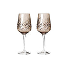 To farget krystallglass med fasettslipt diamantmønster i skandinavisk design fra Frederik Bagger.