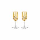 To høye, fasettslipte portvinsglass i sitrongult klart glass med skandinavisk design av Frederik Bagger.