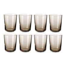 Åtte brune, sylindriske vannglass i skandinavisk stil fra Frederik Bagger med minimalistisk design.